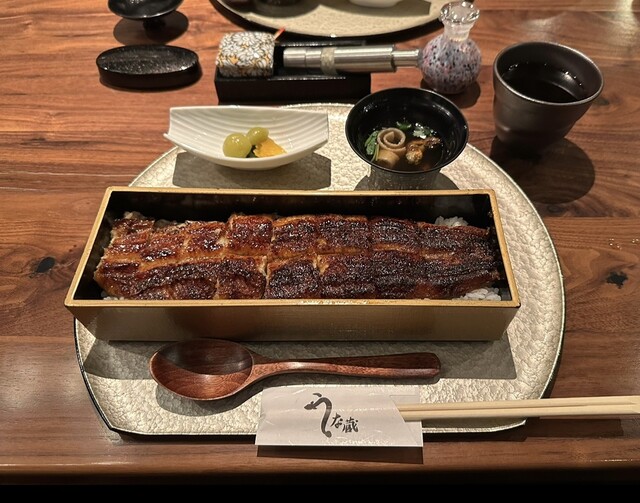 Inside the dazzlingly Asian-themed restaurant, enjoy grilled eel.