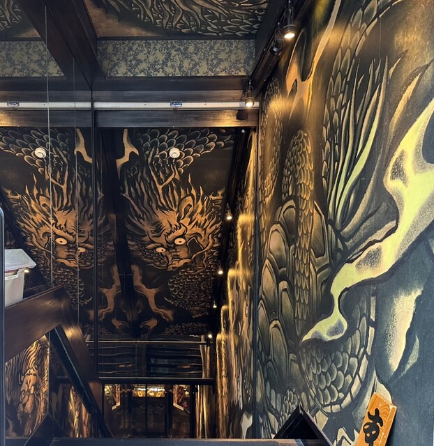 Inside the dazzlingly Asian-themed restaurant, enjoy grilled eel.
