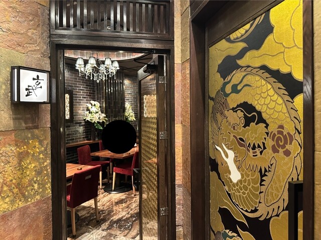 Inside the dazzlingly Asian-themed restaurant, enjoy grilled eel.