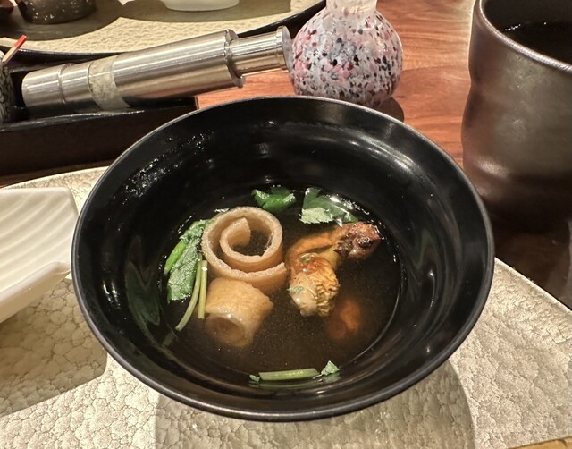 Inside the dazzlingly Asian-themed restaurant, enjoy grilled eel.